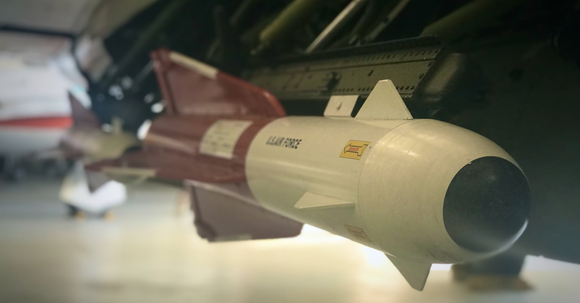 Looking head-on at an AIM-4 Falcon IR-guided air-to-air missile on a fighter jet's pylon